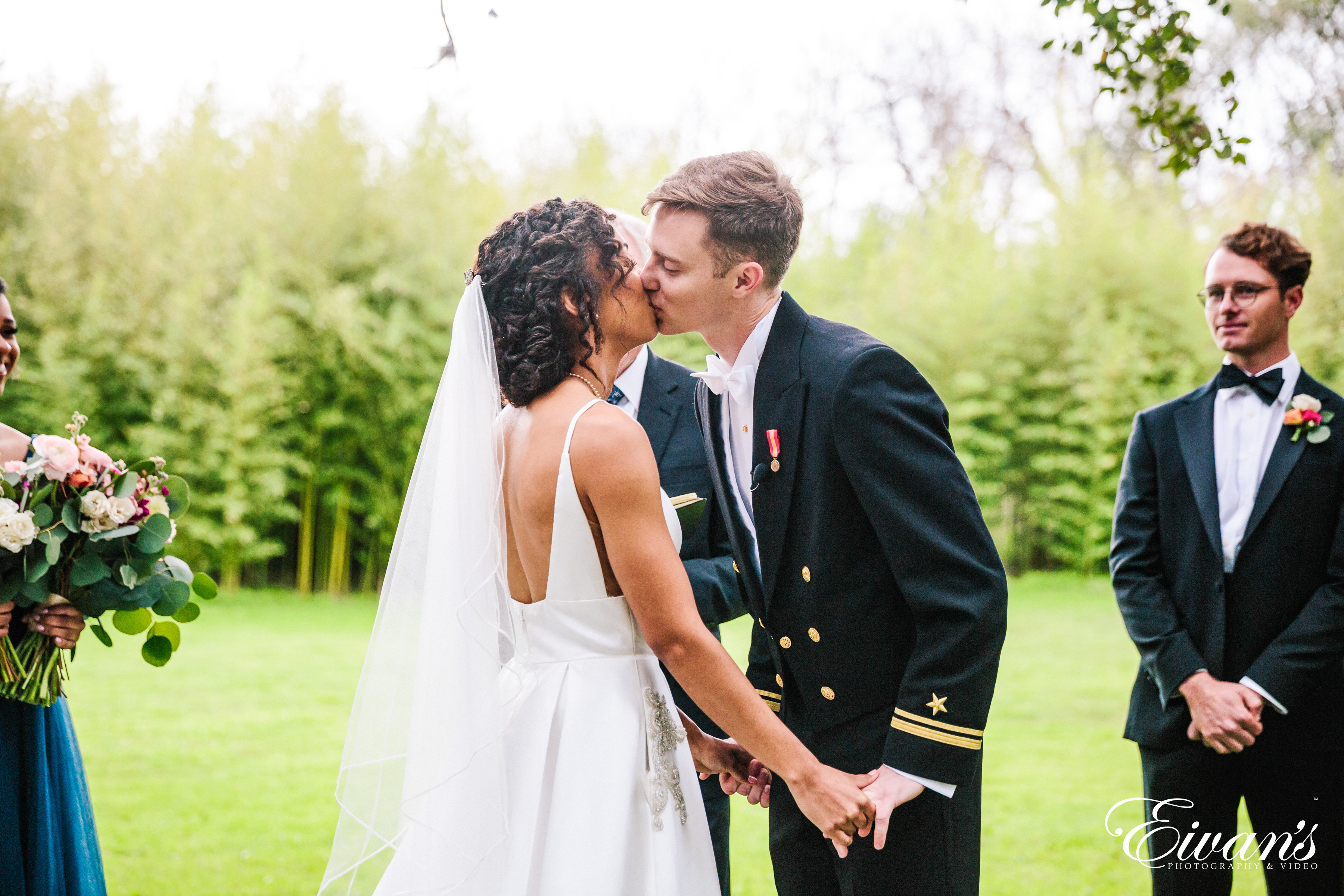 First Kiss Wedding Photos  Eivan's Photography & Video